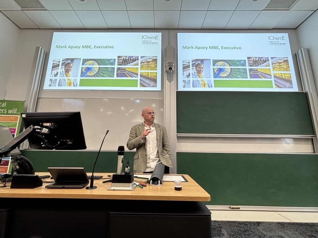 Mark Apsey lecturing in a university lecture theatre